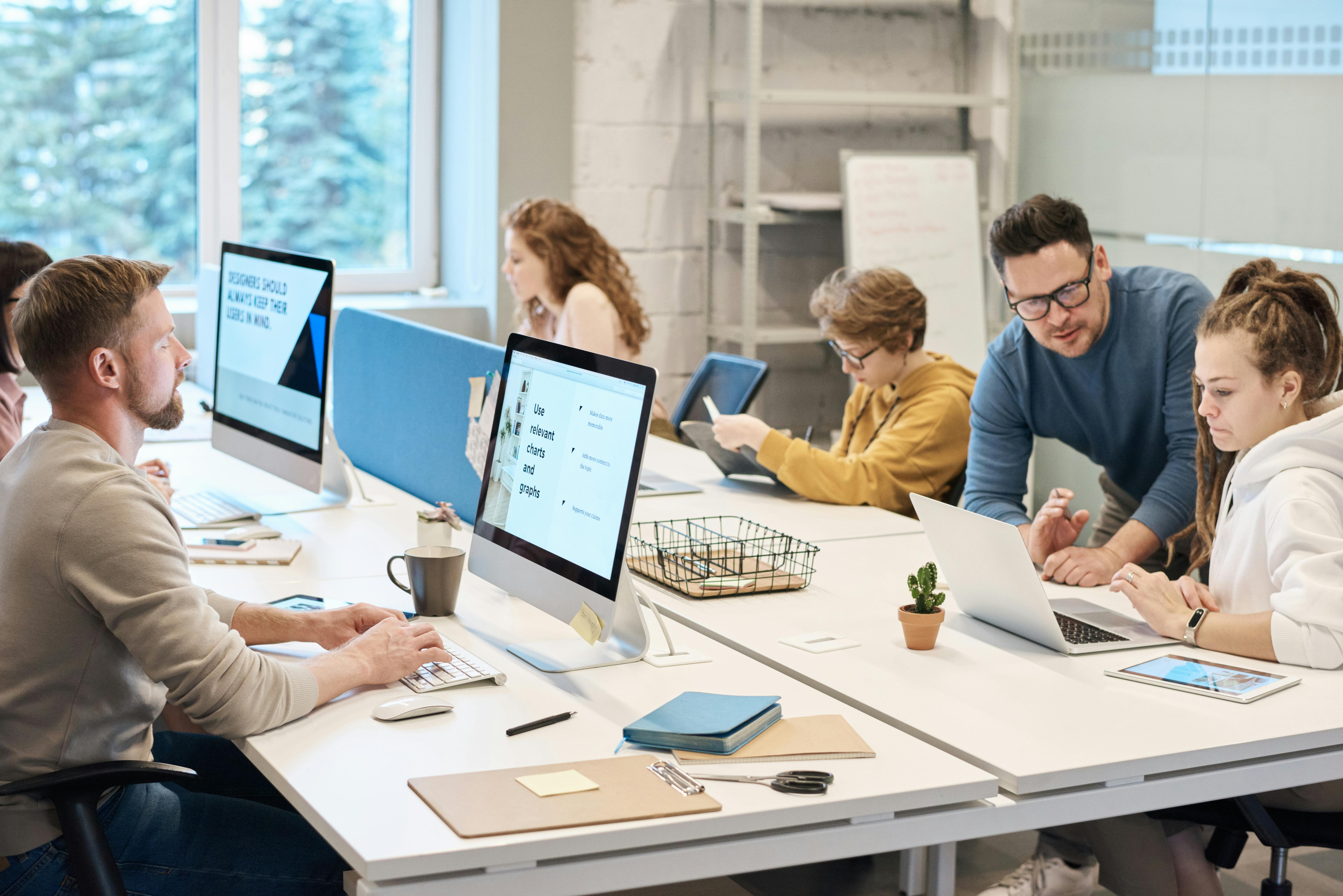Professional web design team collaborating on modern websites